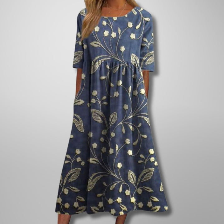 Women's floral summer maxi dress with square neck, 3/4 sleeves, empire waist, and pockets for effortless style.