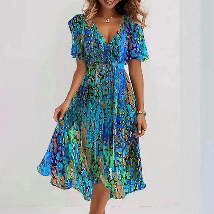 Elegant floral V-neck wrap midi dress for women, with flutter sleeves, ideal for summer parties & vacations.