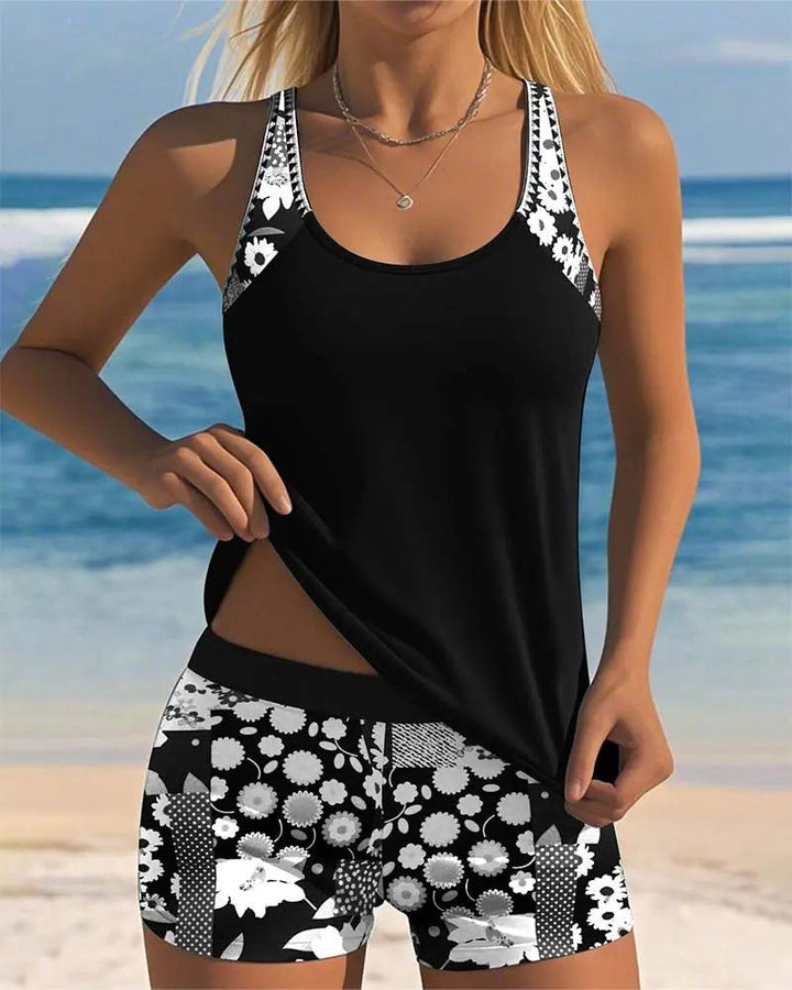Two-piece women's floral tankini swimsuit set & modest swim shorts for summer beachwear.