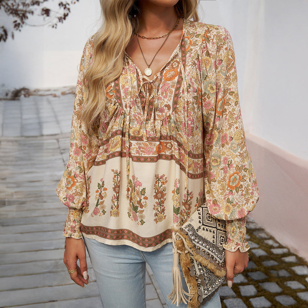 Lightweight floral long sleeve top for women, featuring a trendy tie front detail.