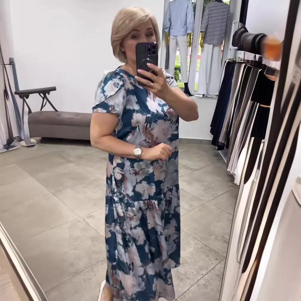 Stylish women's sleeveless floral maxi dress, perfect for summer vacations, spring fashion, and casual elegance.