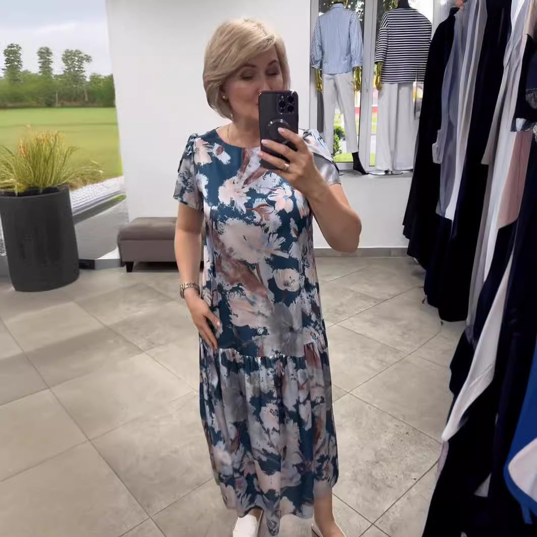 Comfortable women's floral tiered maxi dress in a flowy design, ideal for effortless summer style and vacation.