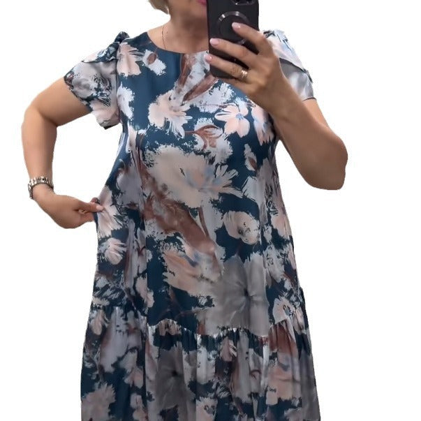 Sleeveless floral tiered maxi dress for women, featuring a vibrant print and elegant, long, flowy summer style.