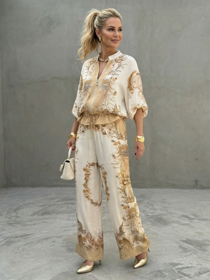 Women's floral two-piece set with relaxed fit, wide leg pants, and a baroque print satin effect top for summer.