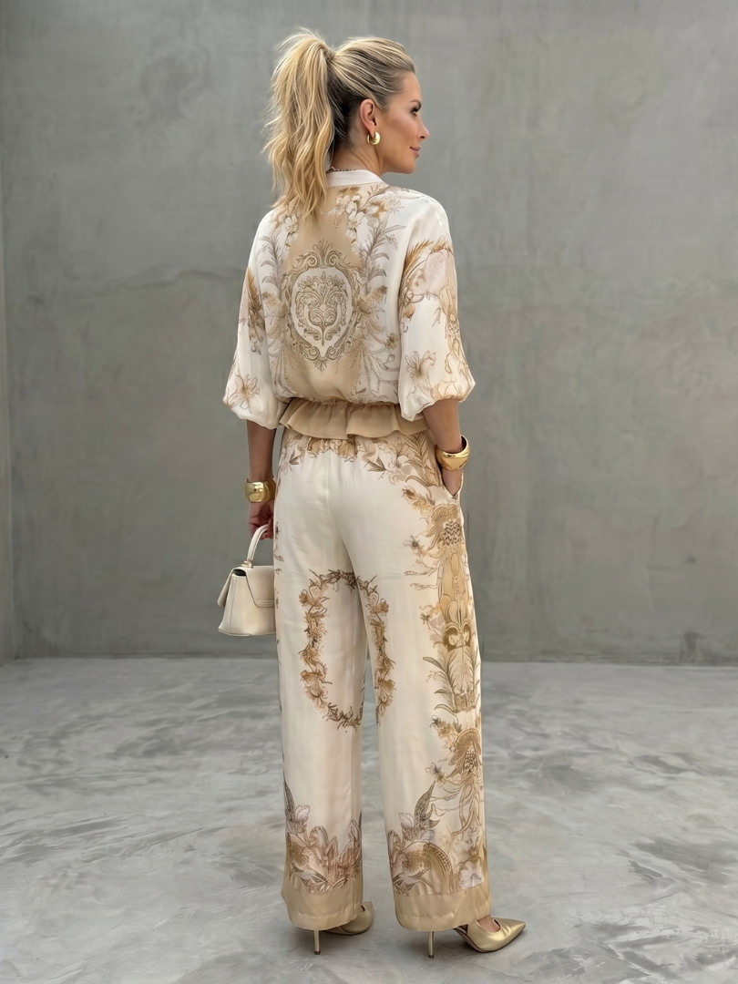 Versatile women's relaxed fit floral two-piece set with wide leg trousers, ideal for smart casual summer outfits.