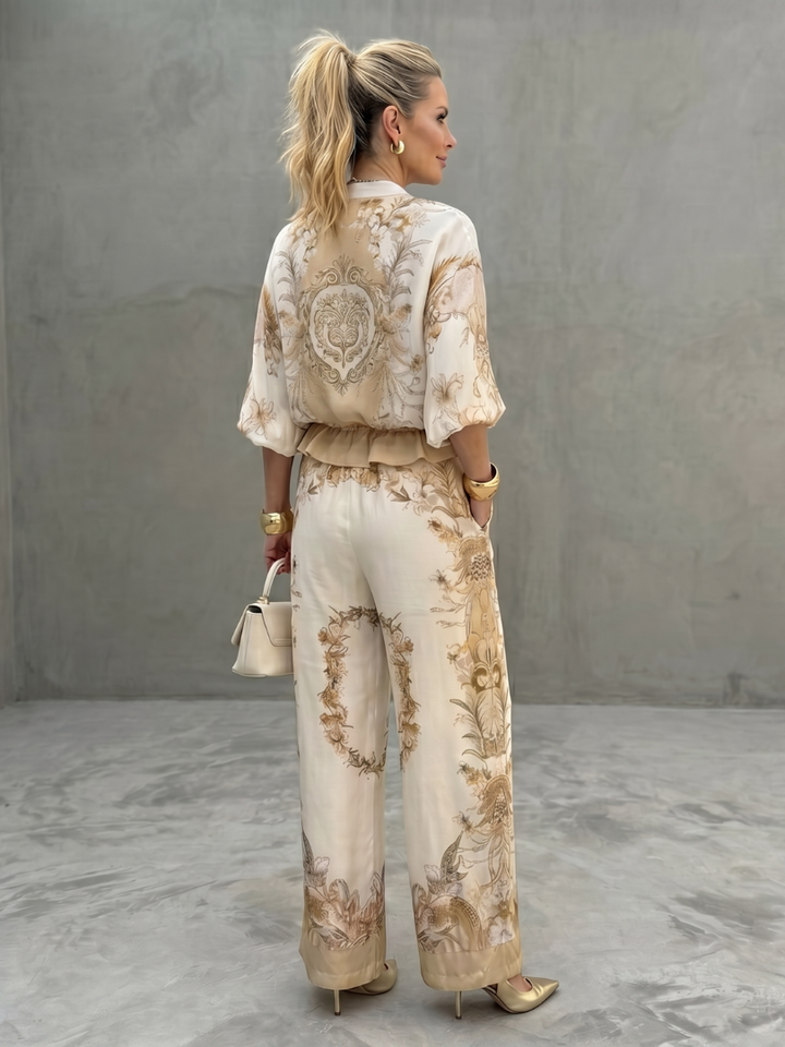 Versatile women's relaxed fit floral two-piece set with wide leg trousers, ideal for smart casual summer outfits.