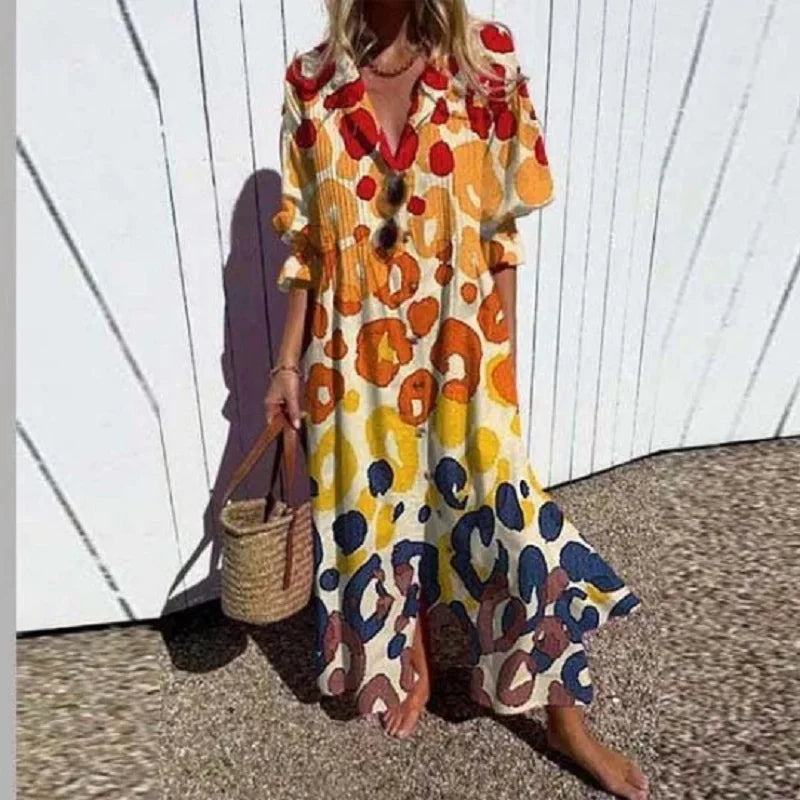 Bohemian floral maxi dress with V-neck & long sleeves. Flowy & comfortable, ideal for summer vacation.