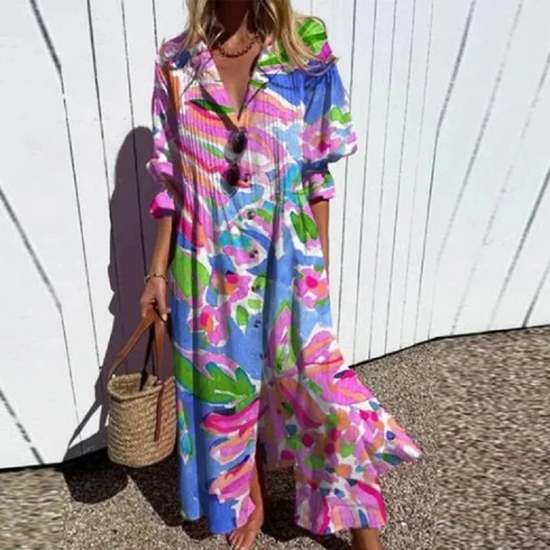 Elegant women's maxi dress featuring a vibrant floral pattern, V-neck, and long sleeves. Comfortable spring attire.