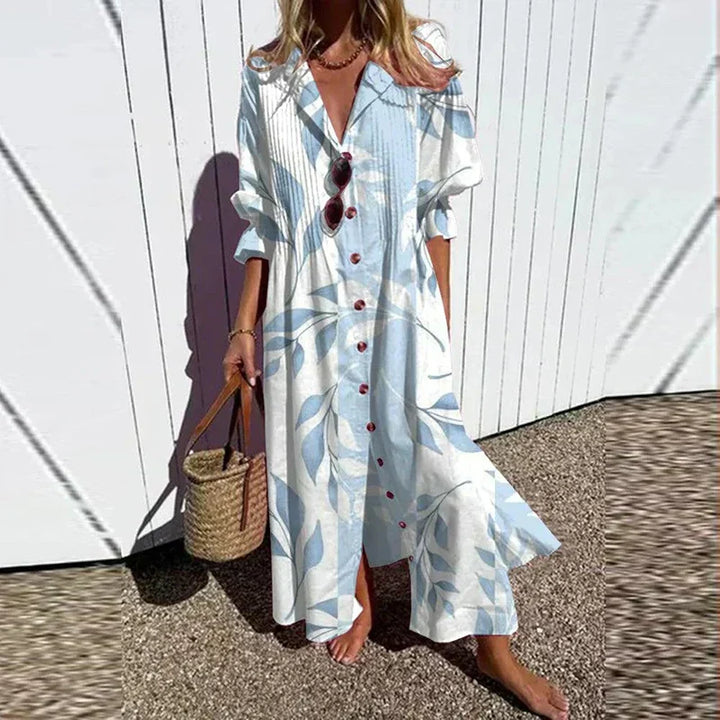 Versatile women's floral maxi dress with V-neck and long sleeves. Suitable for elegant or casual spring/summer wear.