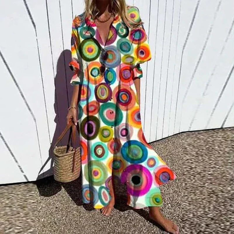 Flowy women's long sleeve maxi dress with a beautiful floral print & V-neck. Perfect for spring elegance or vacation.