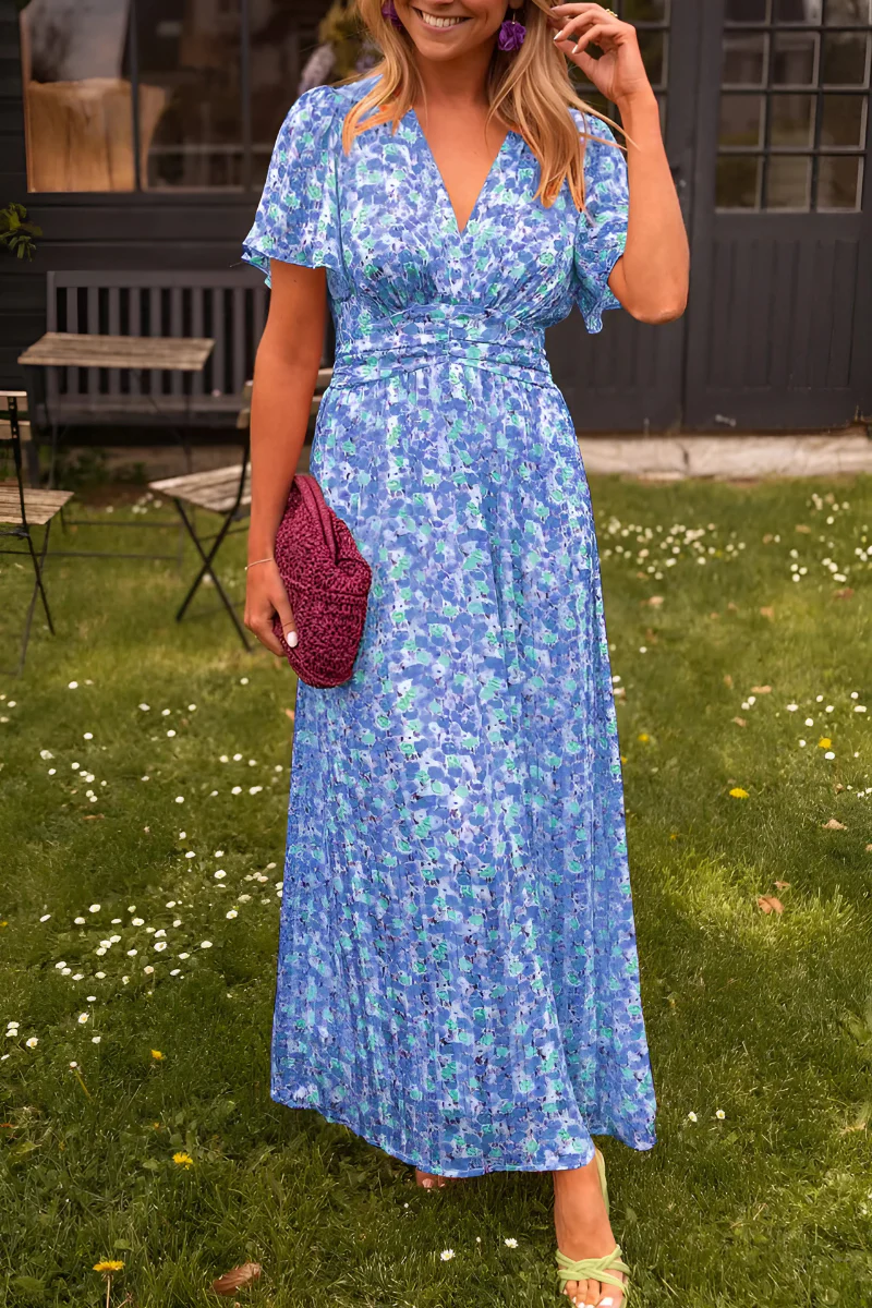 Elegant floral V-neck maxi dress with flutter sleeves & flowy skirt, ideal for special occasion wear.