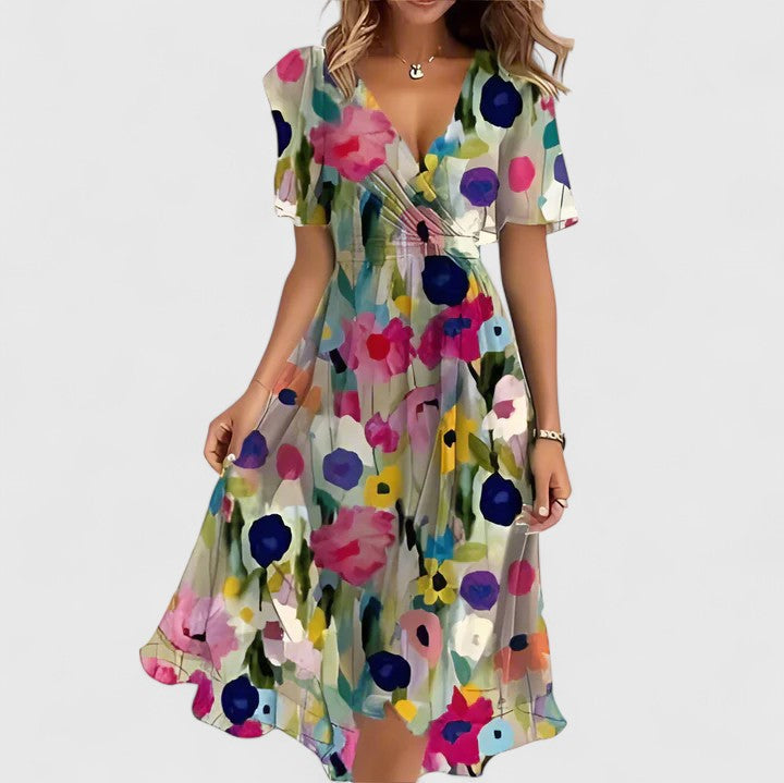 Flowy elegant floral V-neck midi dress for women. Ideal casual summer dress, comfortable and stylish fashion.