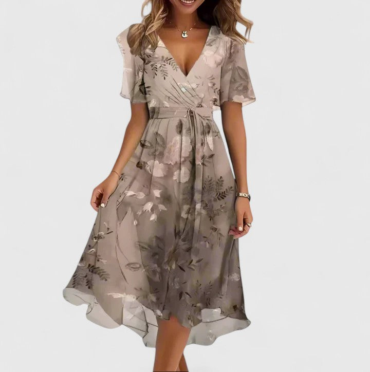 Beautiful floral print V-neck midi dress for women, showcasing effortless summer style. Perfect occasion wear.