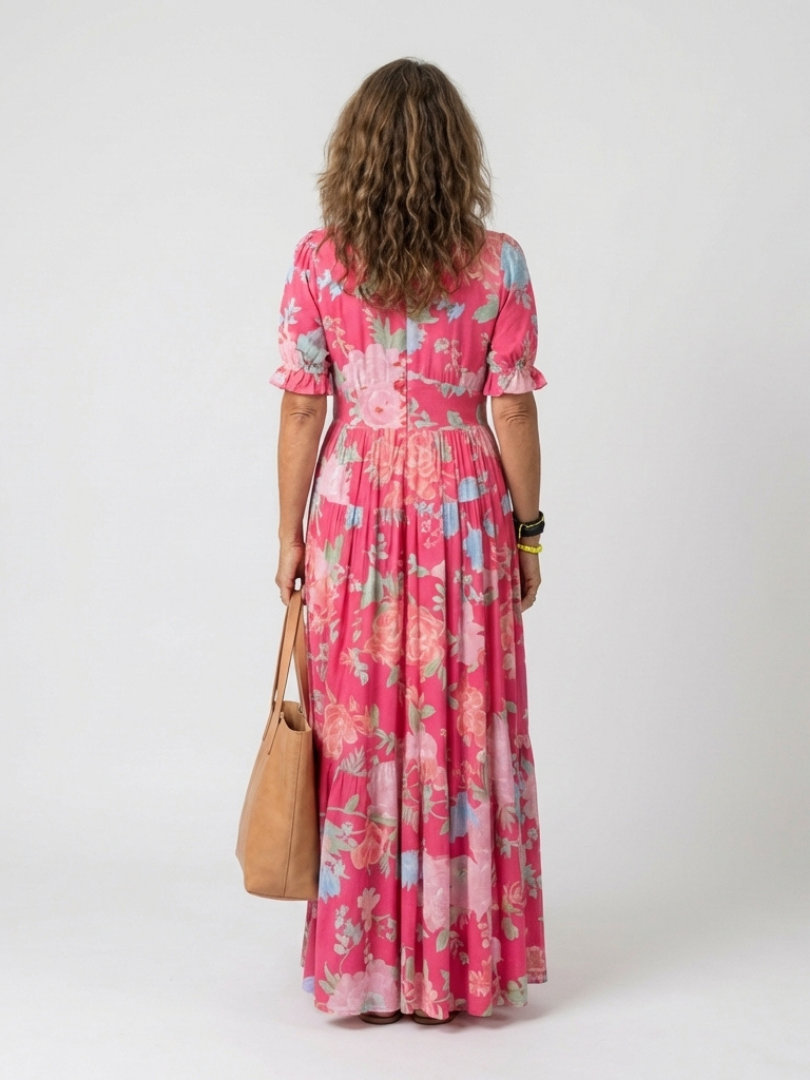 Elegant women's V-neck floral midi dress with flowy flutter sleeves. A beautiful and comfortable day dress.
