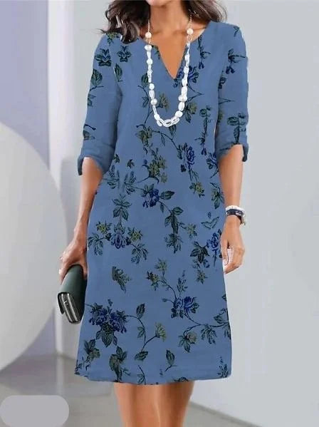 Stylish women's short sleeve V-neck floral mini dress, a versatile summer and spring casual outfit.
