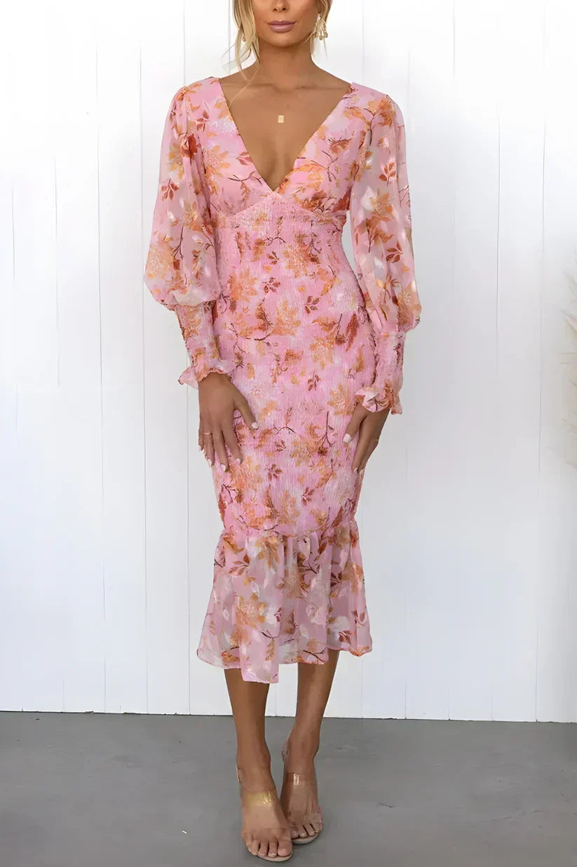 Elegant women's midi wrap dress with vibrant floral print, flattering fit for summer wedding guests.