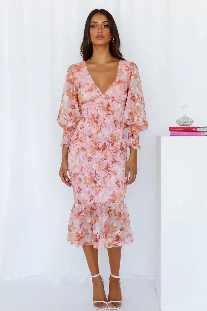 Lightweight floral wrap midi dress for women, stylish & comfortable, perfect for spring/summer wedding guests.