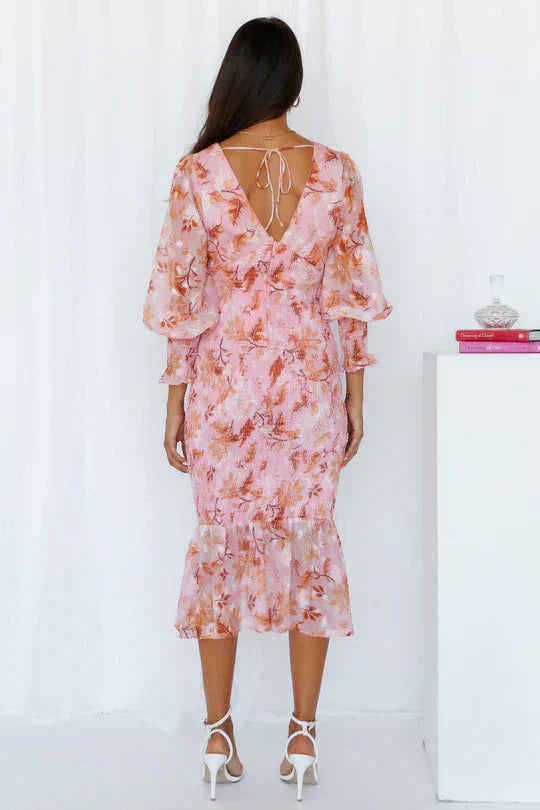 Beautiful floral pattern midi dress for women, flattering wrap design, elegant choice for wedding guests.
