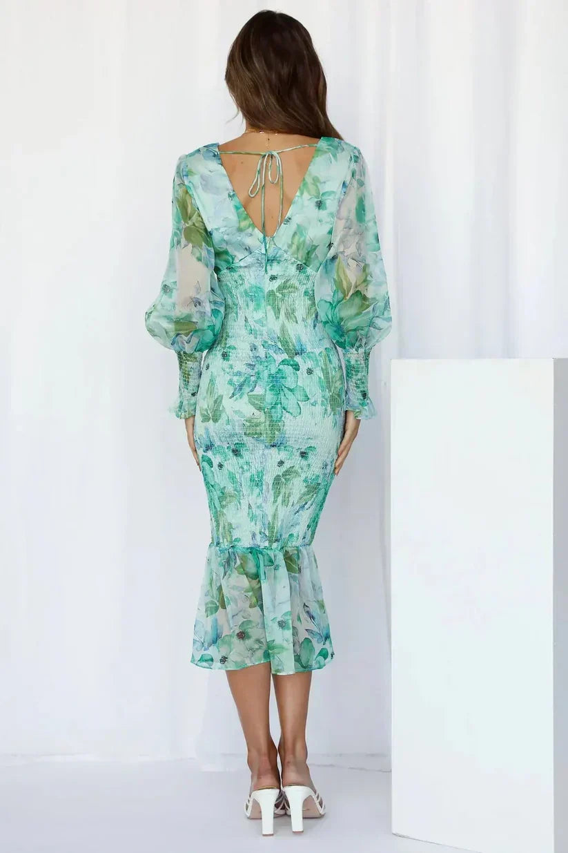Versatile floral midi wrap dress for women, stylish for wedding guests, parties, or elegant summer events.