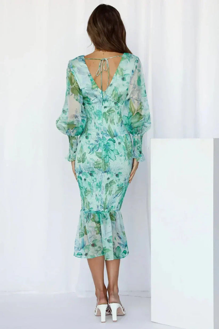Versatile floral midi wrap dress for women, stylish for wedding guests, parties, or elegant summer events.