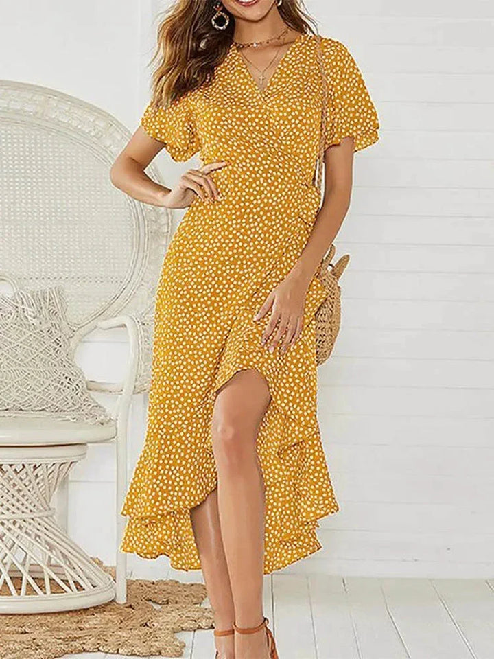 Stylish women's floral print midi wrap dress with V-neck, flutter sleeves, and flattering tie waist.