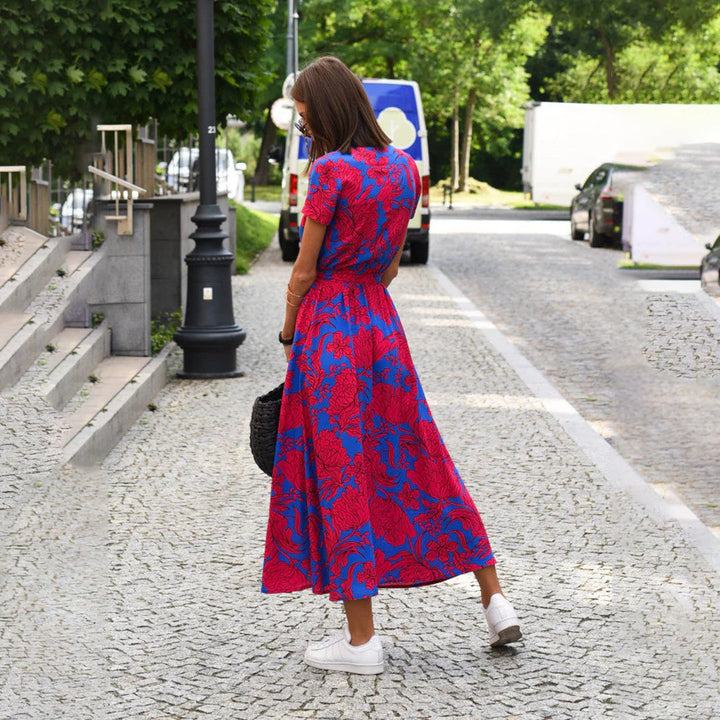 Stylish women's floral wrap midi dress with short sleeves, comfortable & chic.