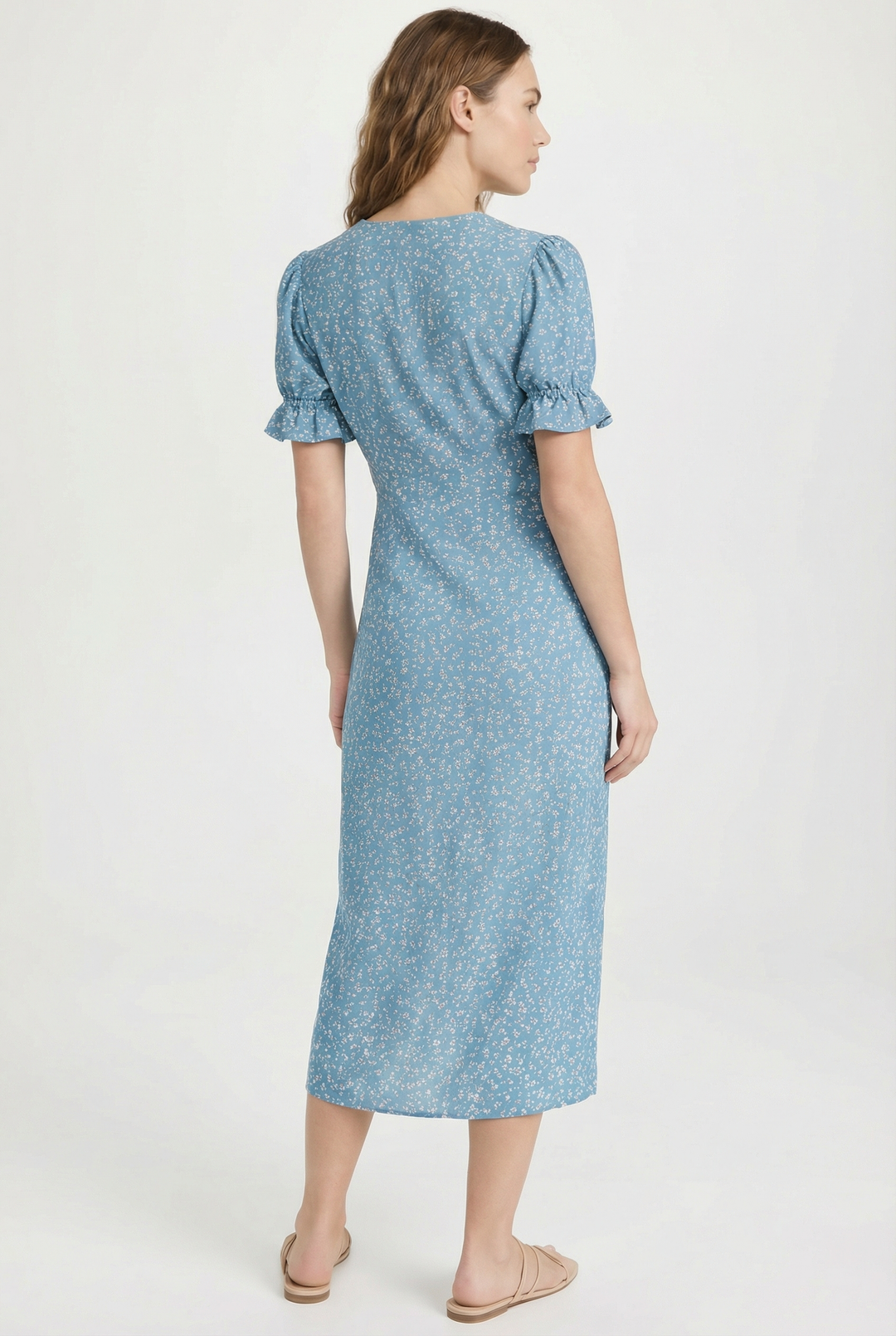 Elegant women's midi dress featuring a flattering floral wrap design and v-neck.