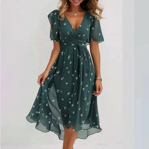 Women's floral wrap summer dress with V-neck, perfect for elegant day wear or parties.