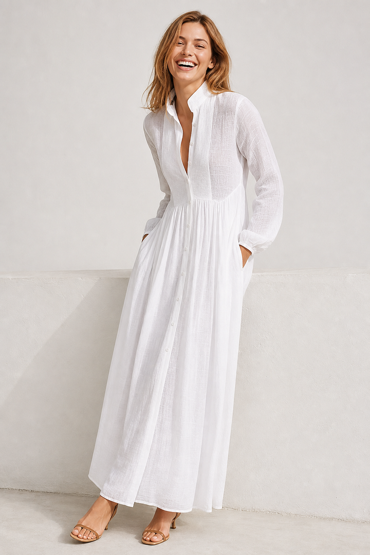 Women's flowing A-Line maxi dress with practical pockets, ideal for effortless everyday style.