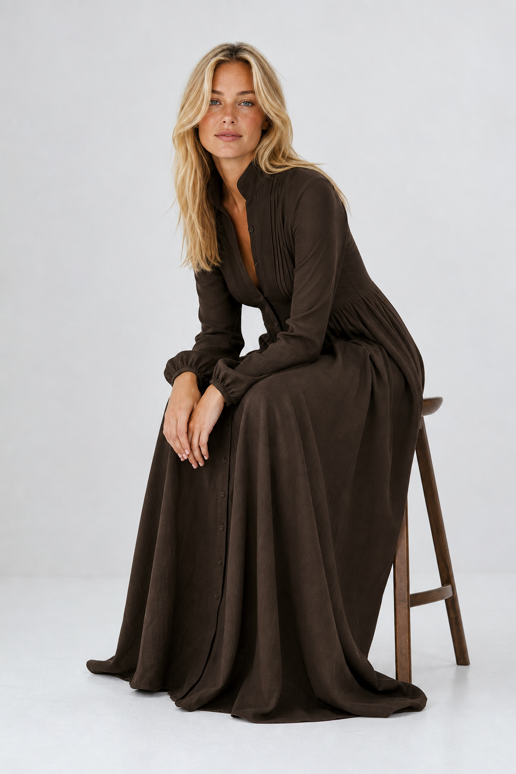 Chic women's all-season maxi dress, flowing A-line style, long sleeves, V-neck, and practical pockets.
