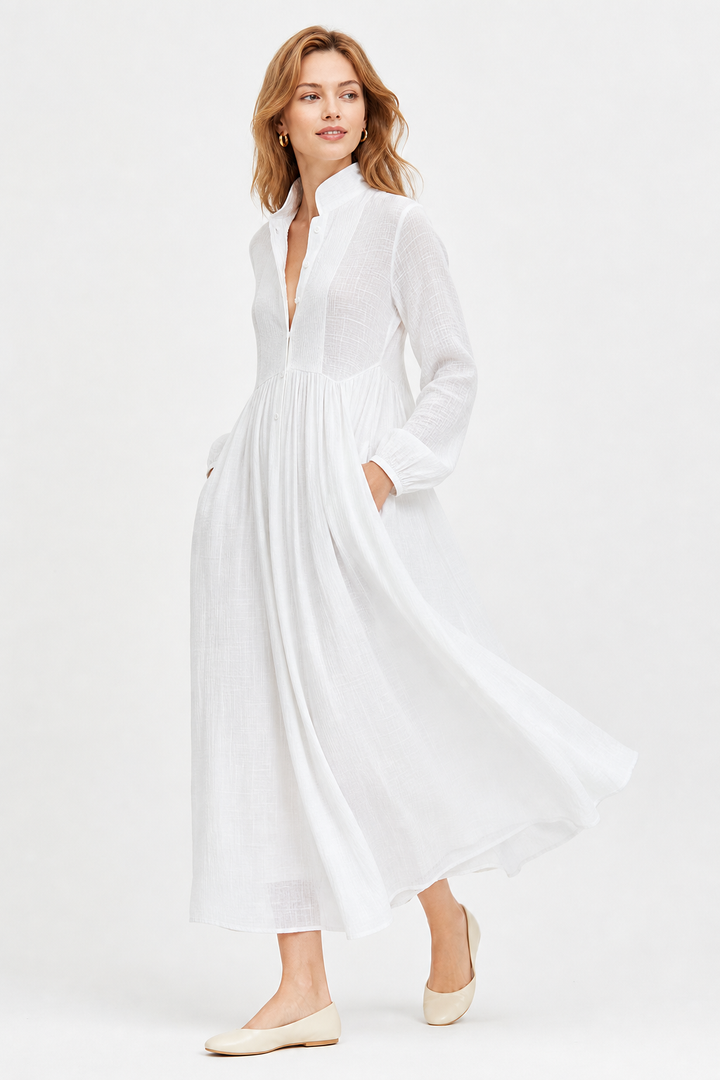 Elegant long sleeve V-neck maxi dress for women, featuring a relaxed fit and convenient pockets.
