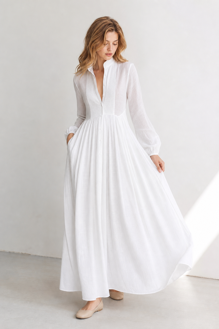 Casual women's A-Line maxi dress with a flowing silhouette, long sleeves, and handy side pockets.