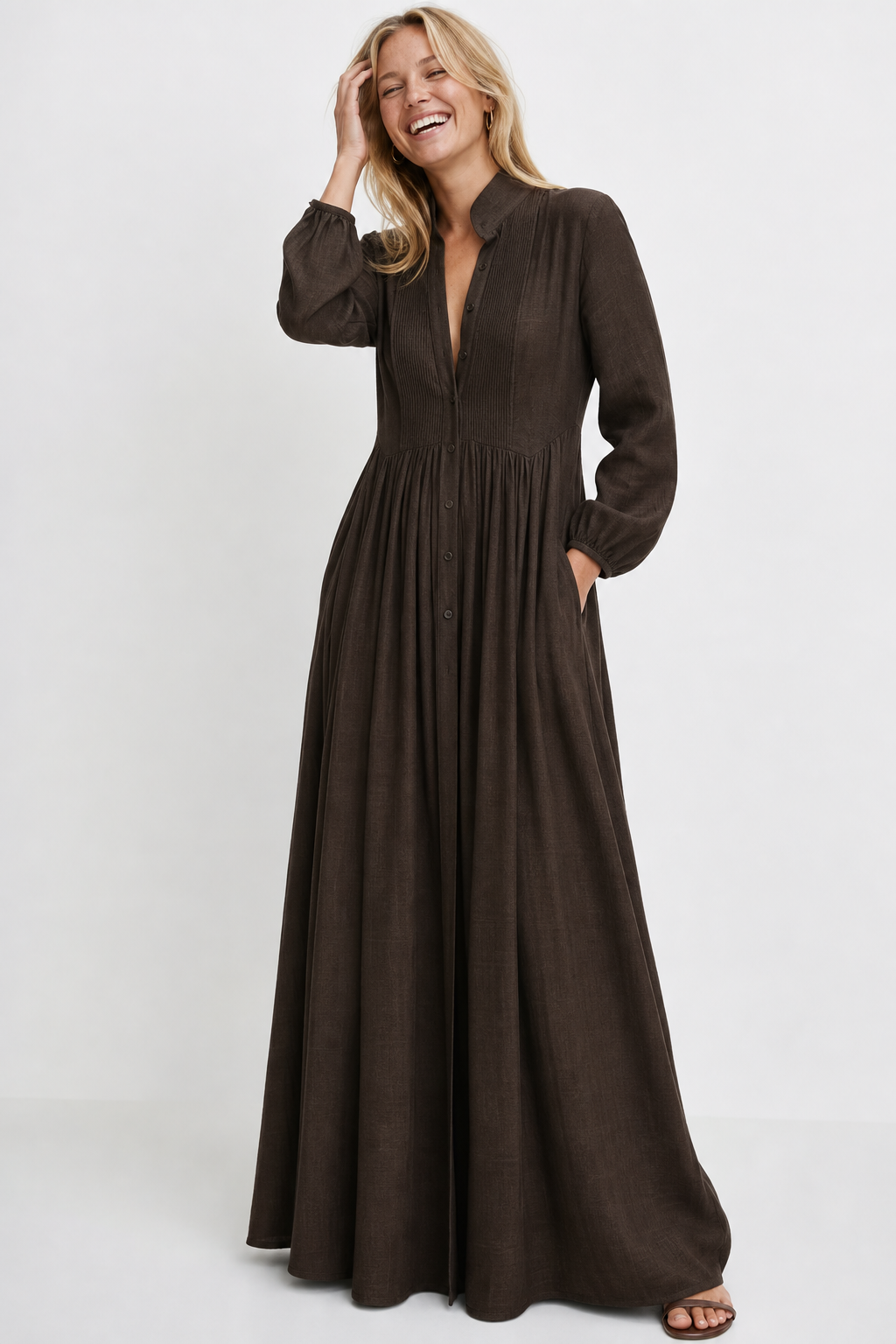 All-season women's V-neck maxi dress with A-line cut, long sleeves, and practical pockets for comfort.