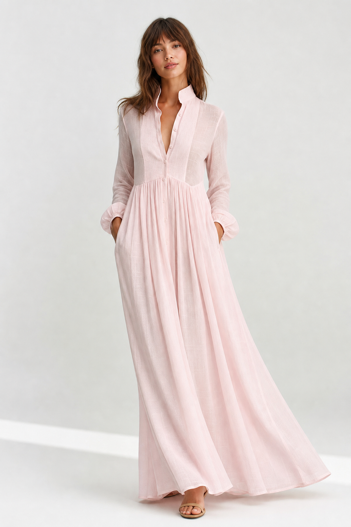 Relaxed fit women's flowing maxi dress, A-line style with long sleeves, V-neck, and essential pockets.