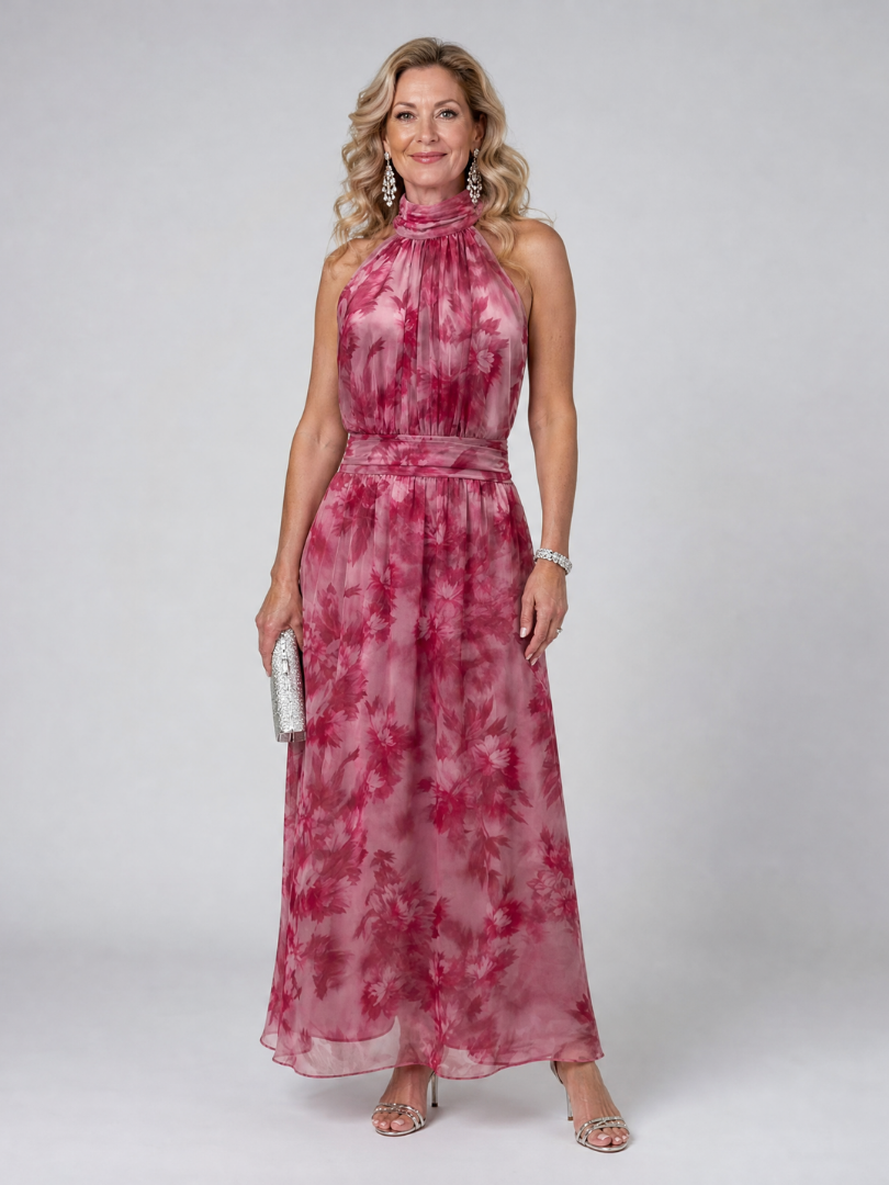 Women's flowing halter neck midi dress in a vibrant color, perfect for summer parties & elegant occasions.