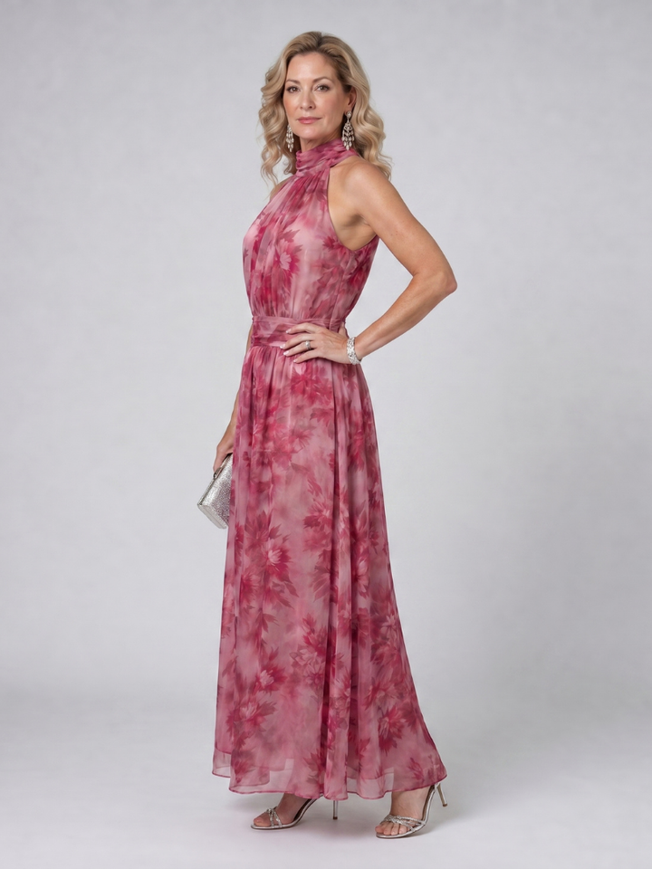 Flowy women's halter neck midi dress, excellent for summer events & special occasions. Comfortable and chic.