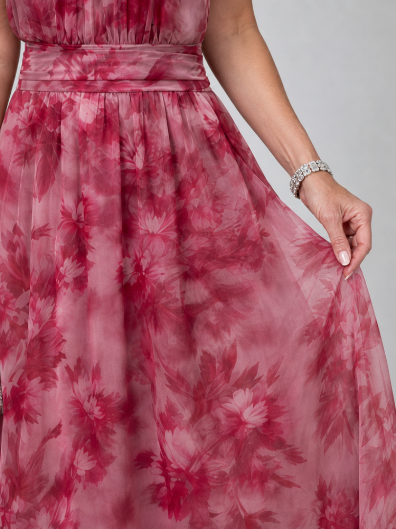 Chic women's halter midi dress with a flowing skirt, perfect for a sophisticated party or an evening event.
