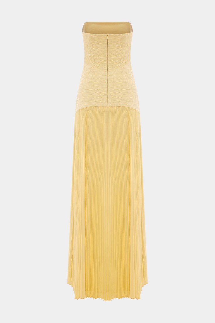 Women's long elegant maxi dress. Flowing design, romantic style, & a chic front slit for versatile wear.