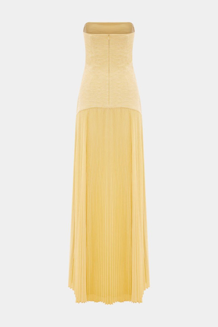 Women's long elegant maxi dress. Flowing design, romantic style, & a chic front slit for versatile wear.