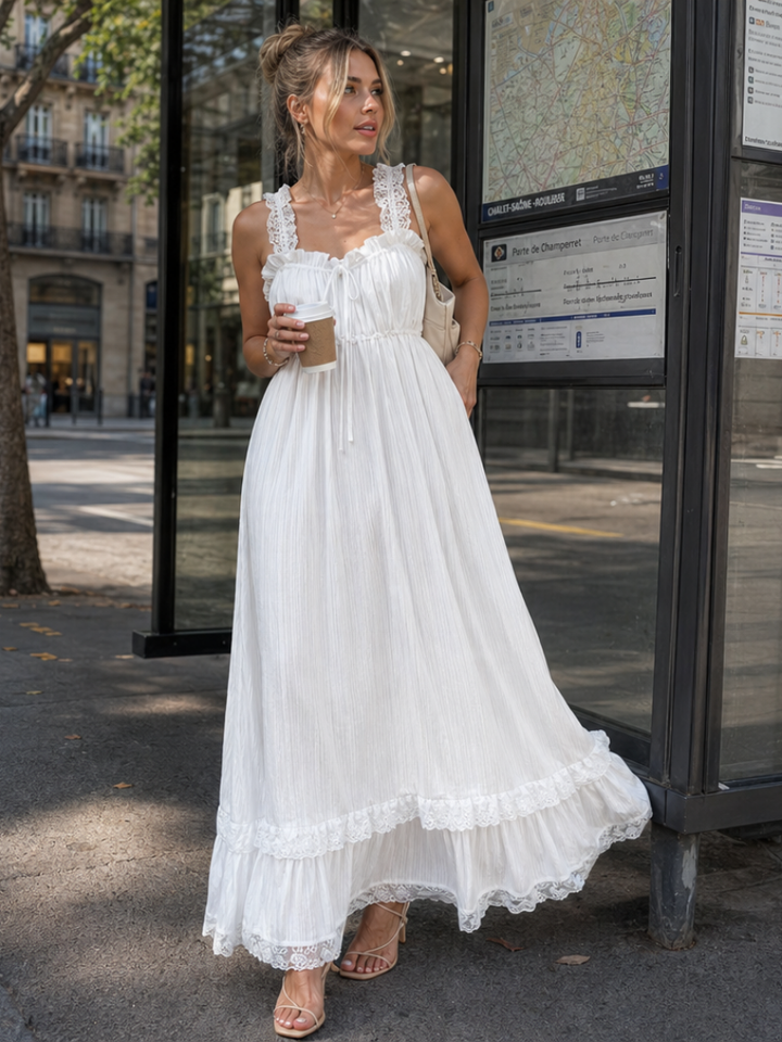 Women's flowing midi dress with elegant ruffle straps, perfect for summer casual wear or vacation. Sleeveless & comfortable.