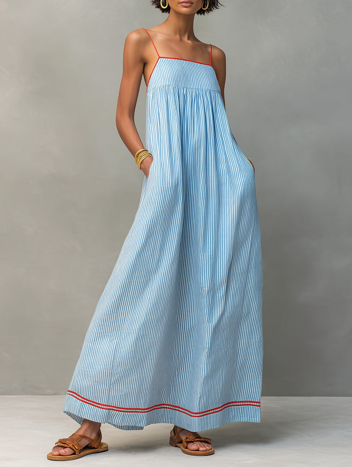 Beautiful women's striped maxi dress with practical pockets, ideal for a flowy & stylish look.