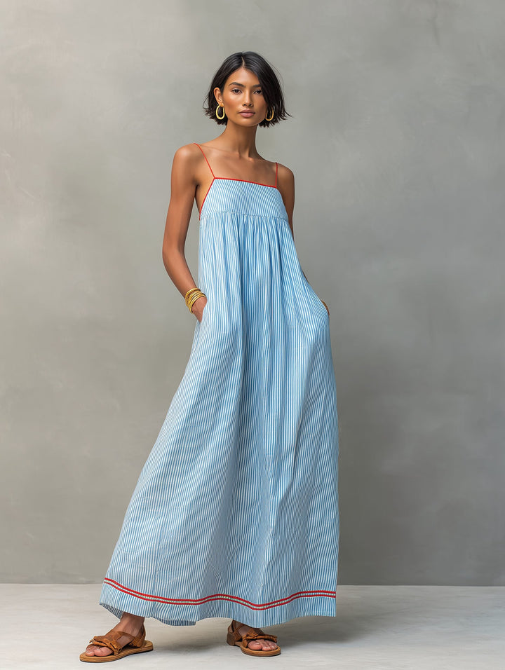 Elegant sleeveless striped maxi dress for women, ideal for vacation or beach outings, flowy design.