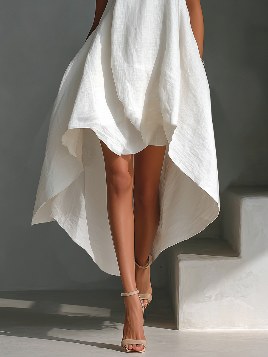 Women's flowy midi dress with an asymmetric layered hem. Perfect sleeveless dress for casual summer days.