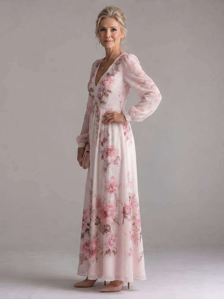 Relaxed fit women's floral print midi dress featuring long sleeves & comfortable flowy fabric. Ideal spring fashion.