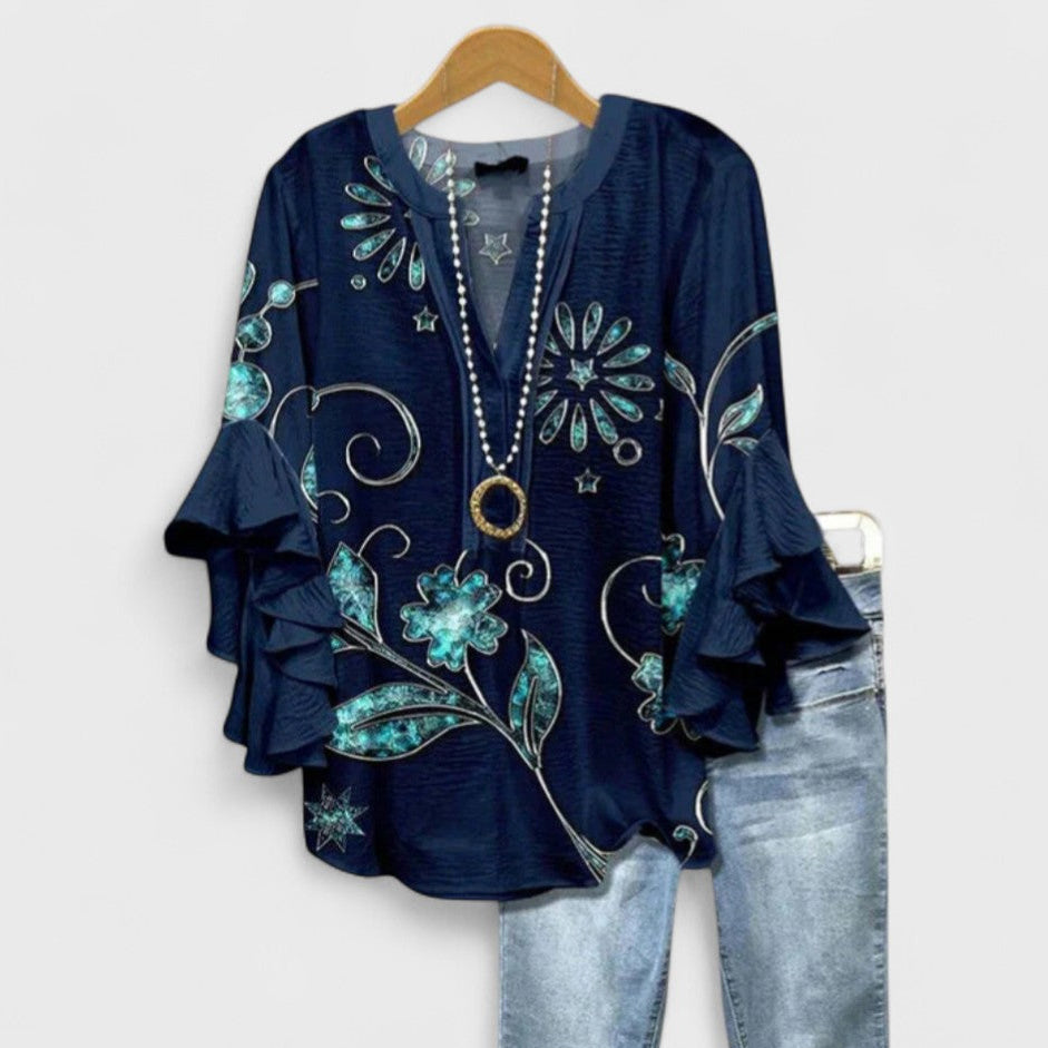 Women's summer fashion blouse: flowy floral print, flattering v-neck, delicate ruffles, stylish flare sleeves.