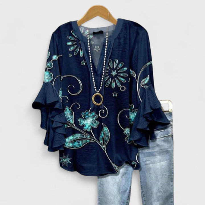 Women's summer fashion blouse: flowy floral print, flattering v-neck, delicate ruffles, stylish flare sleeves.