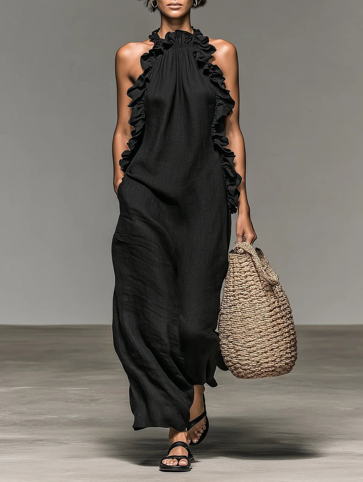 Women's flowy halterneck maxi dress with elegant ruffles, perfect for summer vacations.