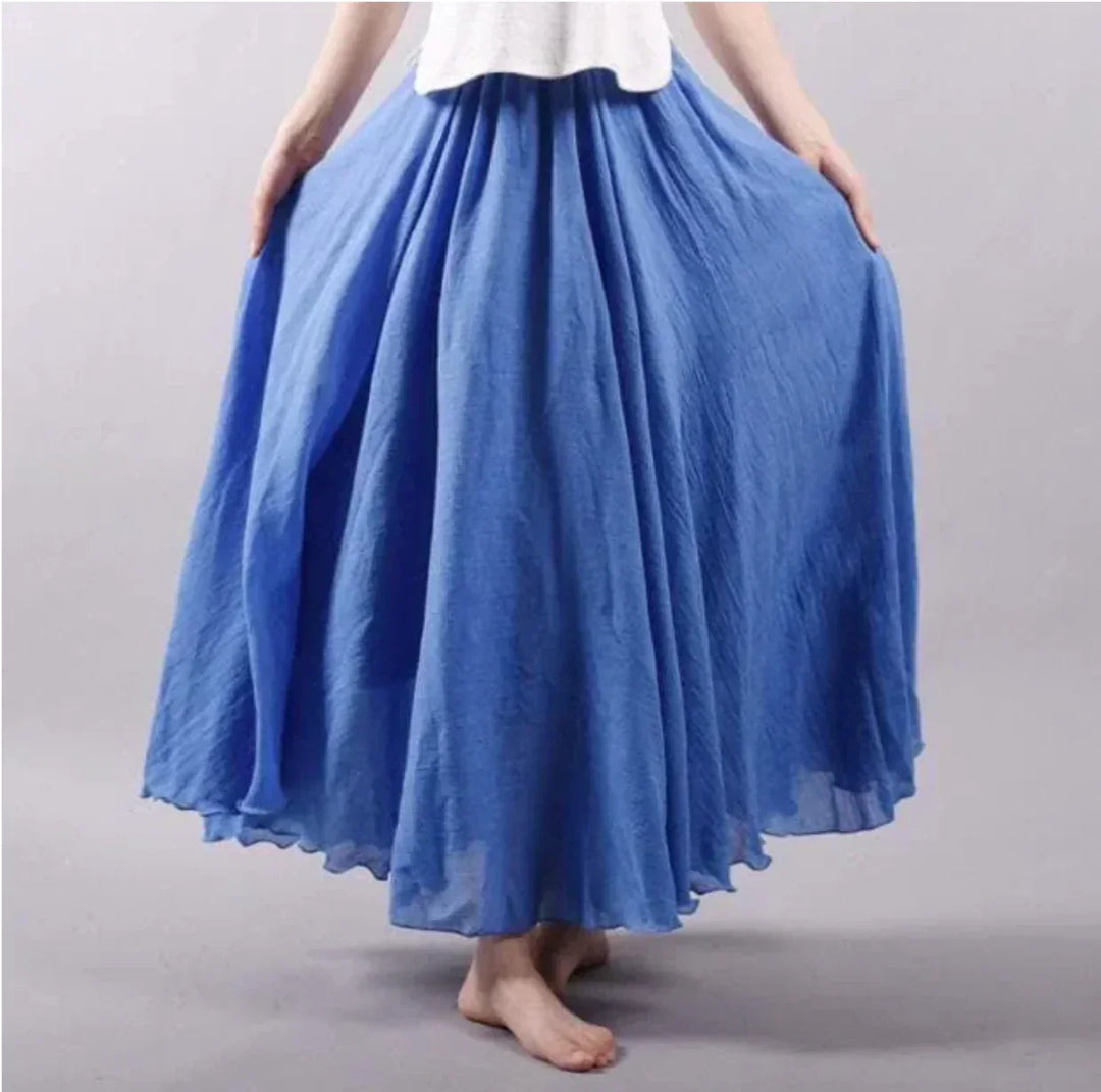 Close-up of a high-waisted boho maxi skirt, flattering fit and flowy design for a chic, comfortable summer look.