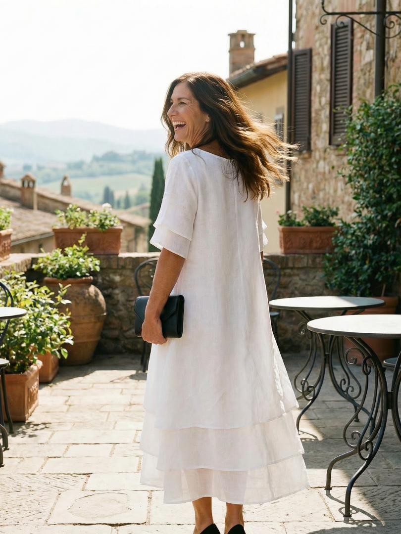 Summer-ready women's flowy layered midi dress with short sleeves, a comfortable casual option.
