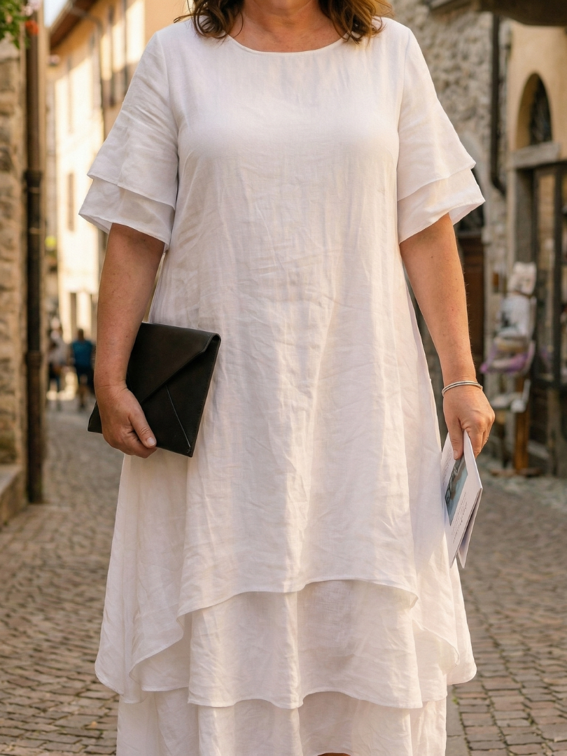 Women's short sleeve flowy layered midi dress, offering comfort and style for casual elegant wear.